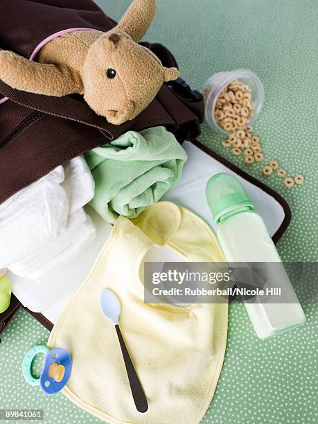 diaper bag spilled over - diaper bag stock pictures, royalty-free photos & images