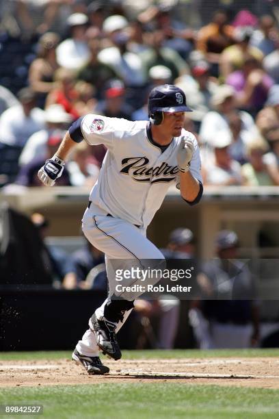 Chase Headley of the San Diego Padres runs to first base during the game against the Atlanta Braves at Petco Park on August 5, 2009 in San Diego,...