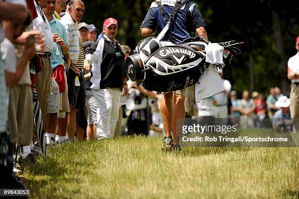 Phil Mickelson's caddie Jim 'Bones' MacKay carries their Callaway bag during the second round of the 109th U.S. Open on the Black Course at Bethpage...