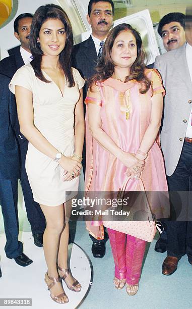 Bollywood actor Priyanka Chopra with Tina Anil Ambani at the launch the latest stereotactic radiosurgery equipment- Novalis TX, at the Kokilaben...