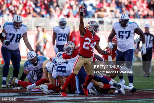 Defensive back K'Waun Williams of the San Francisco 49ers celebrates after his team recovered a fumble against the Tennessee Titans during the second...