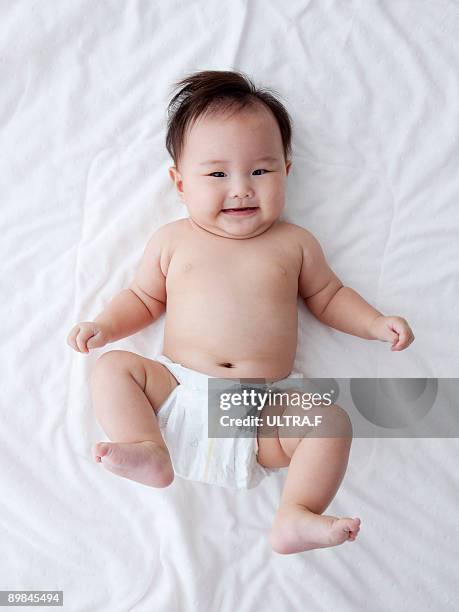 a baby. - nappy stock pictures, royalty-free photos & images