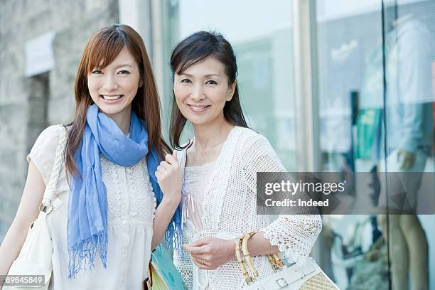 mother and daughter shopping, portrait - japanese mother daughter stock pictures, royalty-free photos & images