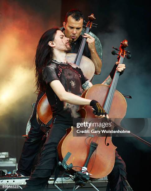 Perttu Kivilaakso and Paavo LÃ¶tjÃ¶nen of Apocalyptica performs on stage on the second day of Bloodstock Open Air festival at Catton Hall on August...