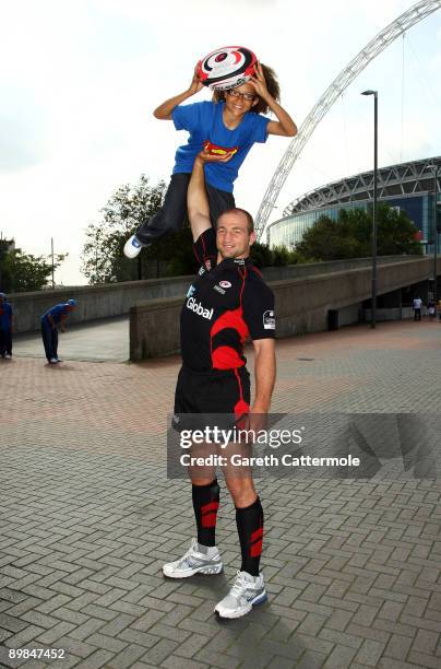 Saracens and England Captain Steve Borthwick and Perri Luc Kiely of Diversity attend a photocall ahead of the Saracens at Wembley Family Fun Day at...