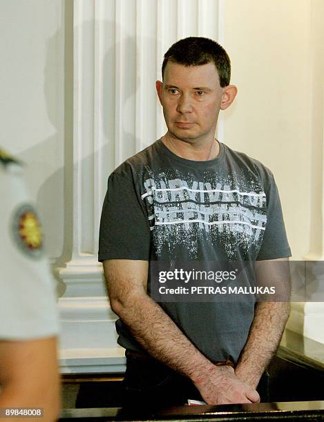 Irish national Michael Campbellstands in the dock during his trial in Vilnius on August 18, 2009. A man suspected of trying to buy arms in Lithuania...