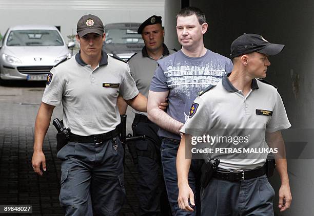 Michael Campbell , a 36-year-old Irish citizen is taken to court in Vilnius on August 18, 2009. Campbell, suspected of trying to buy arms in...