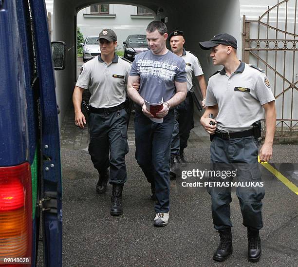 Michael Campbell , a 36-year-old Irish citizen is taken to court in Vilnius on August 18, 2009. Campbell, suspected of trying to buy arms in...