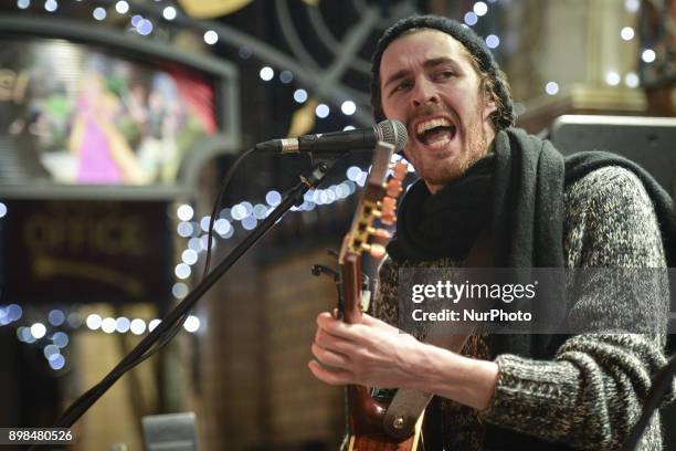 Hozier takes part in the annual Christmas Eve busk in aid of the Dublin Simon Community outside the Gaiety Theater in Dublin. Hundreds attended the...