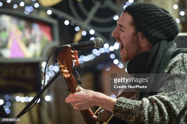 Hozier takes part in the annual Christmas Eve busk in aid of the Dublin Simon Community outside the Gaiety Theater in Dublin. Hundreds attended the...