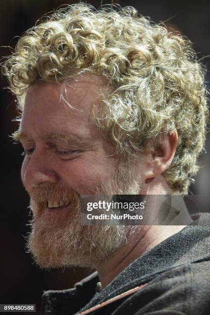 Glen Hansard takes part in the annual Christmas Eve busk in aid of the Dublin Simon Community outside the Gaiety Theater in Dublin. Hundreds attended...