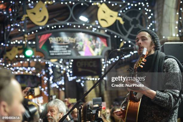 Hozier takes part in the annual Christmas Eve busk in aid of the Dublin Simon Community outside the Gaiety Theater in Dublin. Hundreds attended the...