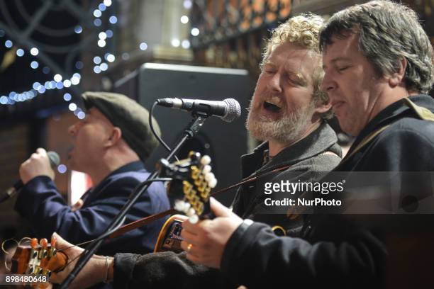 Glen Hansard joins other Irish musicians and takes part in the annual Christmas Eve busk in aid of the Dublin Simon Community outside the Gaiety...