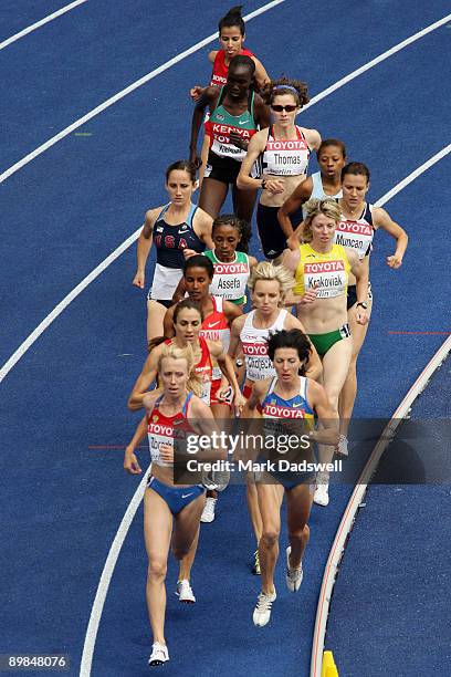 Oksana Zbrozhek of Russia competes with other athletes in the women's 1500 Metres Heats during day four of the 12th IAAF World Athletics...