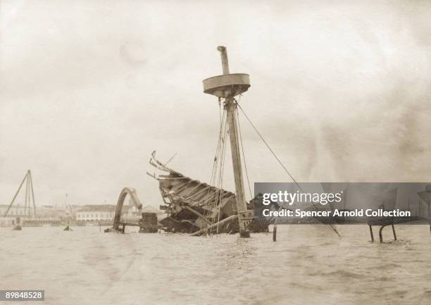 The wreck of the American battleship USS Maine in Havana harbour, 1898. On February 5th 1898, the ship blew up in Havana harbour killing 252 American...