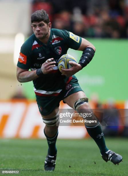 Mike Williams of Leicester Tigers runs with the ball during the Aviva Premiership match between Leicester Tigers and Saracens at Welford Road on...