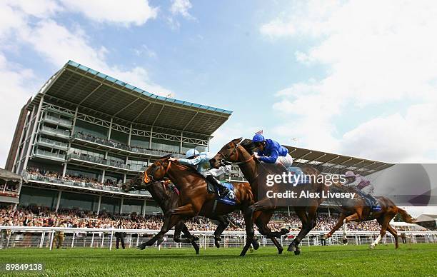 Elusive Pimpernel ridden by Eddie Ahern beats Emerald Commander ridden by Richard Hughes and Poet's Voice ridden by Frankie Dettori to win the The...