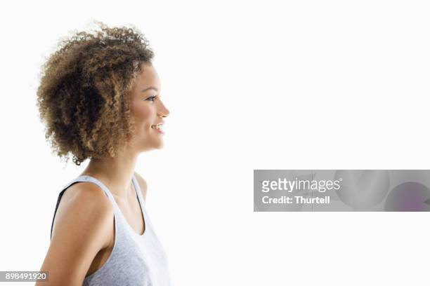 attractive mixed race young woman - looking around on white background stock pictures, royalty-free photos & images