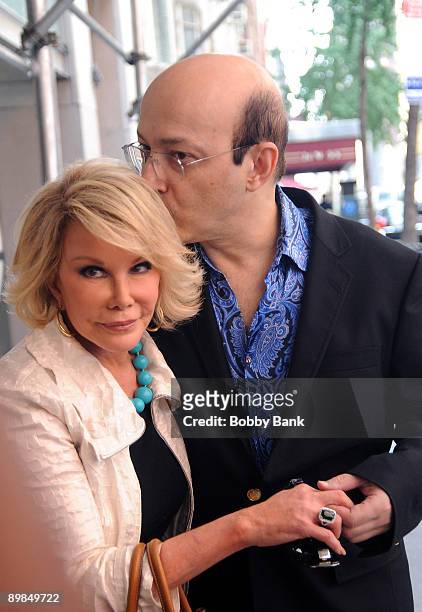 Television personality Joan Rivers with her new boyfriend Norm Zada of Perfect 10 Magazine pose with Joan's "Friendship" ring after having lunch on...