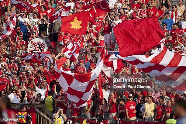 Fans of the Toronto FC cheer on the team during the match against D.C. United at BMO Field on August 15, 2009 in Toronto, Canada. Toronto won the...