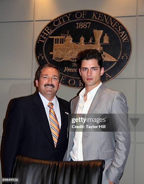 Kennesaw Mayor Mark Mathews and Sean O'Pry attend a proclamation ceremony at City Hall on August 17, 2009 in Kennesaw, Georgia.