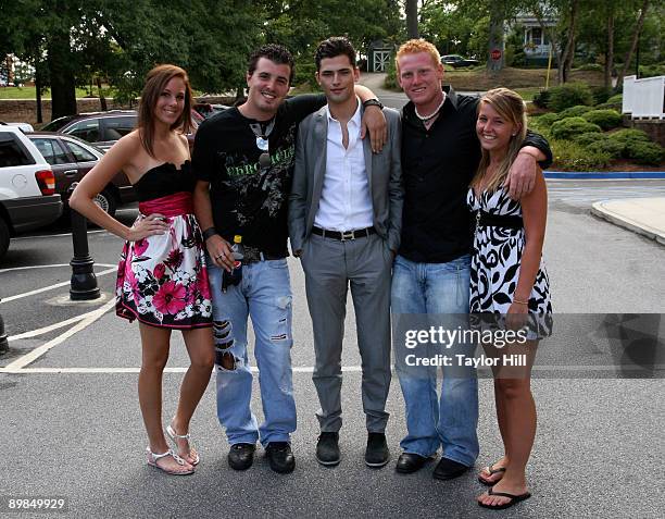 Sean O'Pry and high school friends attend a proclamation ceremony at City Hall on August 17, 2009 in Kennesaw, Georgia.