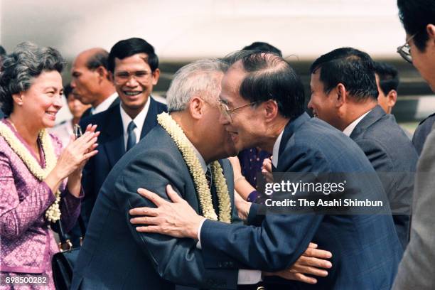 Prince Norodom Sihanouk of Cambodia is welcomed by United Nations Transitional Authority in Cambodia special representative Yasushi Akashi on arrival...