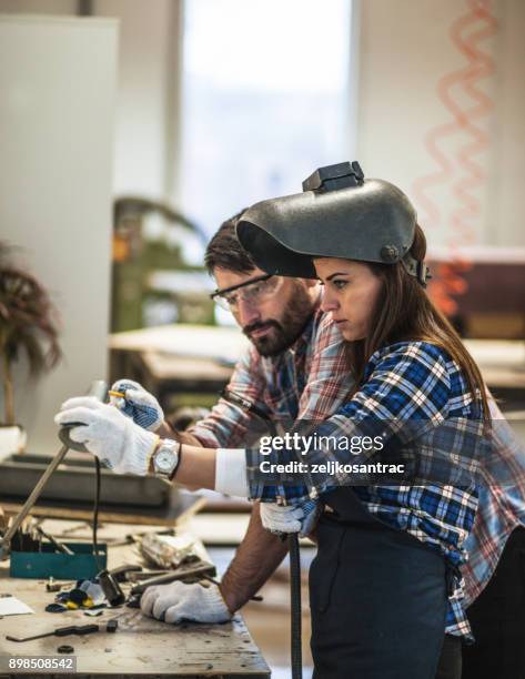 industrial worker with welding tool - metal industry stock pictures, royalty-free photos & images