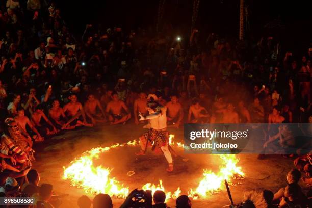 bali kecak dance - fire dancer stock pictures, royalty-free photos & images