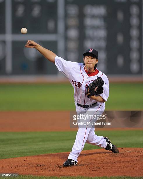 Pitcher Junichi Tazawa of the Boston Red Sox throws a pitch during the game against the Detroit Tigers on August 11, 2009 at Fenway Park in Boston,...