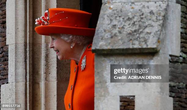 Britain's Queen Elizabeth II leaves the church after attending the Royal Family's traditional Christmas Day church service at St Mary Magdalene...