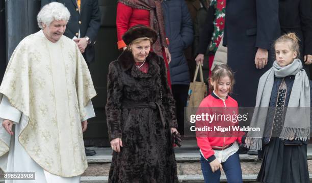 Queen Sonja of Norway, Emma Tallulah Behn of Norway and Leah Isadora Behn of Norway leave the Christmas service at the Holmenkollen Chapel on...