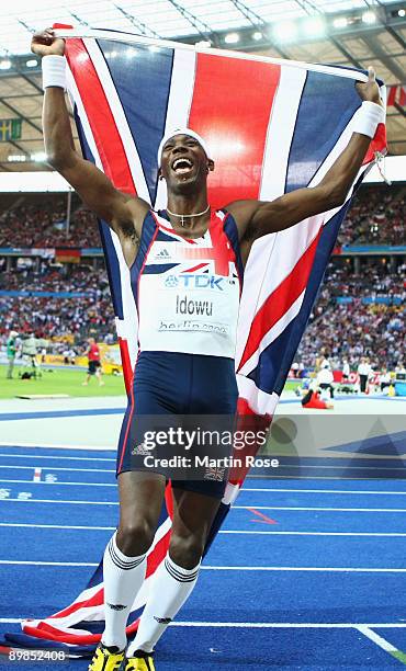 Phillips Idowu of Great Britain & Northern Ireland celebrates winning the gold medal in the men's Triple Jump Final during day four of the 12th IAAF...