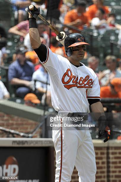 Secondbaseman Brian Roberts of the Baltimore Orioles warms up in the on deck circle during the bottom of the third inning of a game on July 30, 2009...