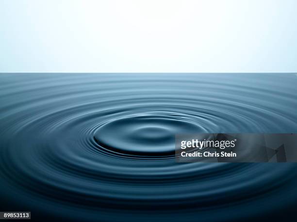 water ripples in a pool of water - rippled stock pictures, royalty-free photos & images