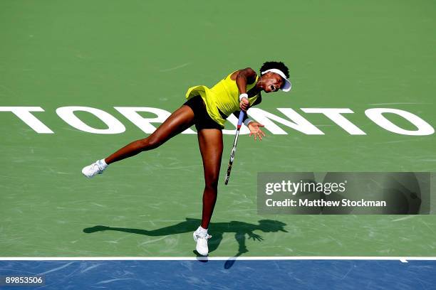 Venus Williams of the United States serves to Kateryna Bondarenko of the Ukraine during the Rogers Cup at the Rexall Center on August 18, in Toronto,...