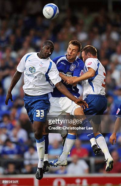 Tamas Priskin of Ipswich jumps for the ball with Alassane N'Diaye and Clint Hill of Palace during the Coca-Cola Championship match between Ipswich...