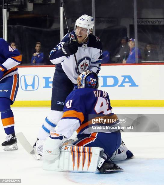Patrik Laine of the Winnipeg Jets skates against the New York Islanders at the Barclays Center on December 23, 2017 in the Brooklyn borough of New...