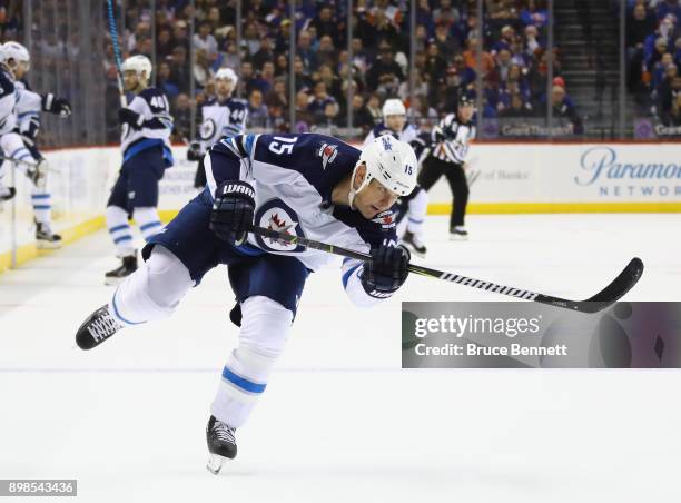 Matt Hendricks of the Winnipeg Jets skates against the New York Islanders at the Barclays Center on December 23, 2017 in the Brooklyn borough of New...