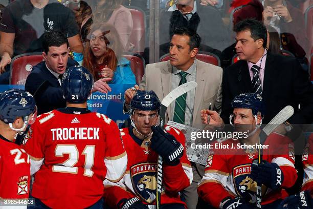 Florida Panthers Head Coach Bob Boughner along with Assistant Coach Paul McFarland and Associate Coach Jack Capuano directs their team from the bench...