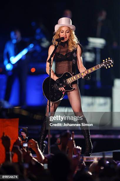 Singer Madonna performs on stage at Olympic Stadium on August 18, 2009 in Munich, Germany.