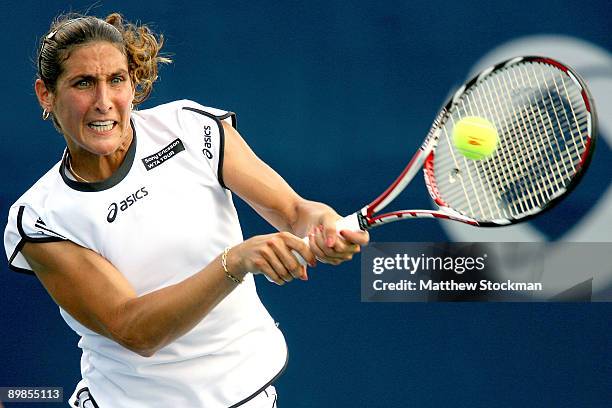 Virginie Razzano of France returns a shot to Ekaterina Makarova of Russia during the Rogers Cup at the Rexall Center on August 18, in Toronto,...