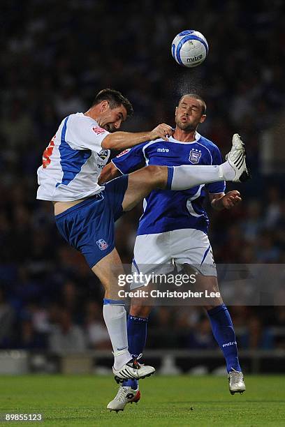 Damien Delaney of Ipswich clears the ball away from Alan Lee of Palace during the Coca-Cola Championship match between Ipswich Town and Crystal...
