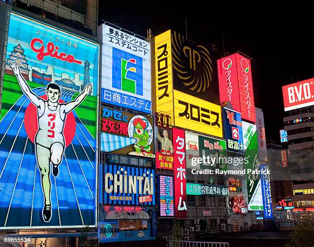 neon signs in shinsaibashi, osaka - japanese script stock pictures, royalty-free photos & images