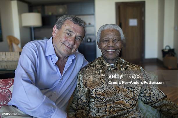 Former President Nelson Mandela of South Africa is greeted by Sol Kerzner on April 2, 2009 at the One&Only hotel in Cape Town, South Africa. Mr....