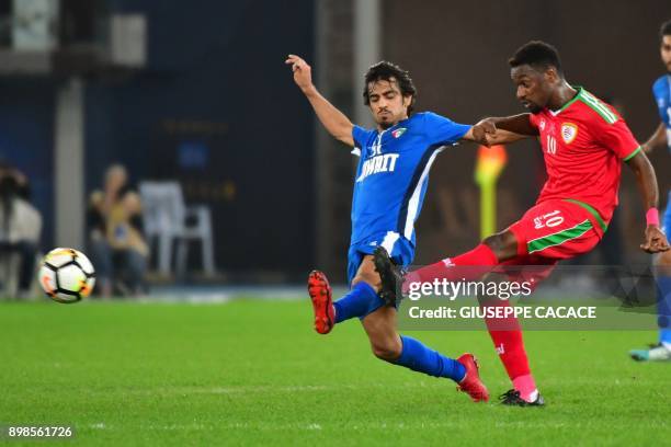 Kuwait's Ali Maqseed vies for the ball with Oman's Mohsin Al-Khaldi during the 2017 Gulf Cup of Nations football match between Kuwait and Oman at the...