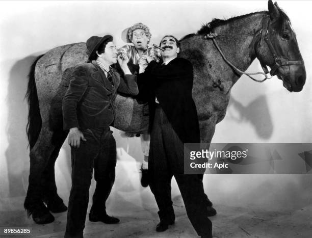 One day at the races A Day at the Races of SamWood with the Marx Brothers Harpo, Chico and Groucho Marx in 1937