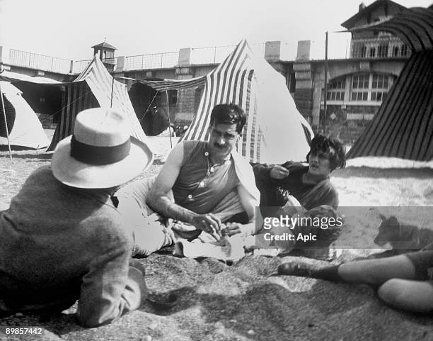 Coco Chanel and her lover Arthur " Boy " Capel with Constent Say on the beach in Saint Jean de Luz in 1917