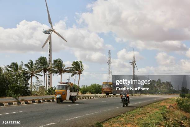 Wind turbines generate electricity in Punniyavalanpuram, Tamil Nadu, India.