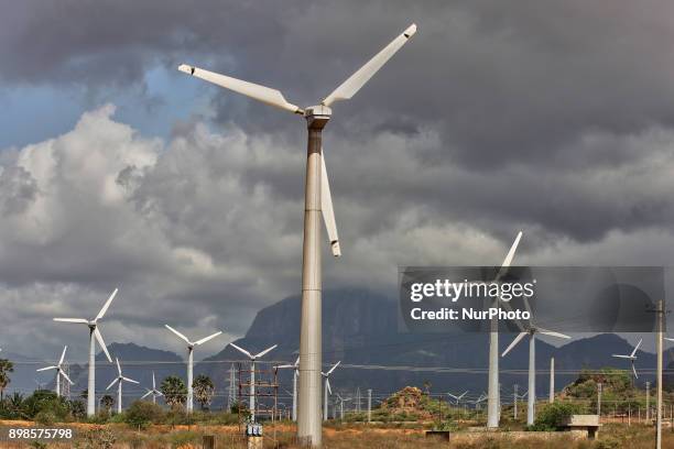 Wind turbines generate electricity in Punniyavalanpuram, Tamil Nadu, India.